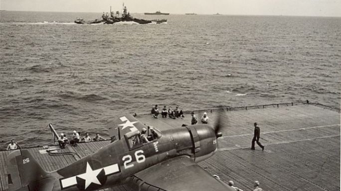 A Hellcat warms up before taking off in October of 1944. Gift of Charles Ives.