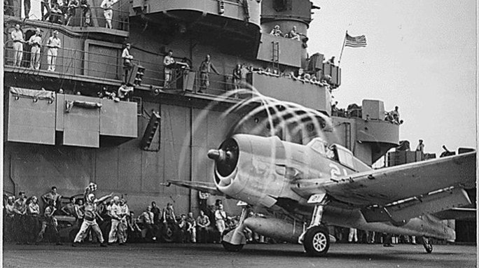 A Hellcat on deck spinning up. Courtesy of the National Archives.